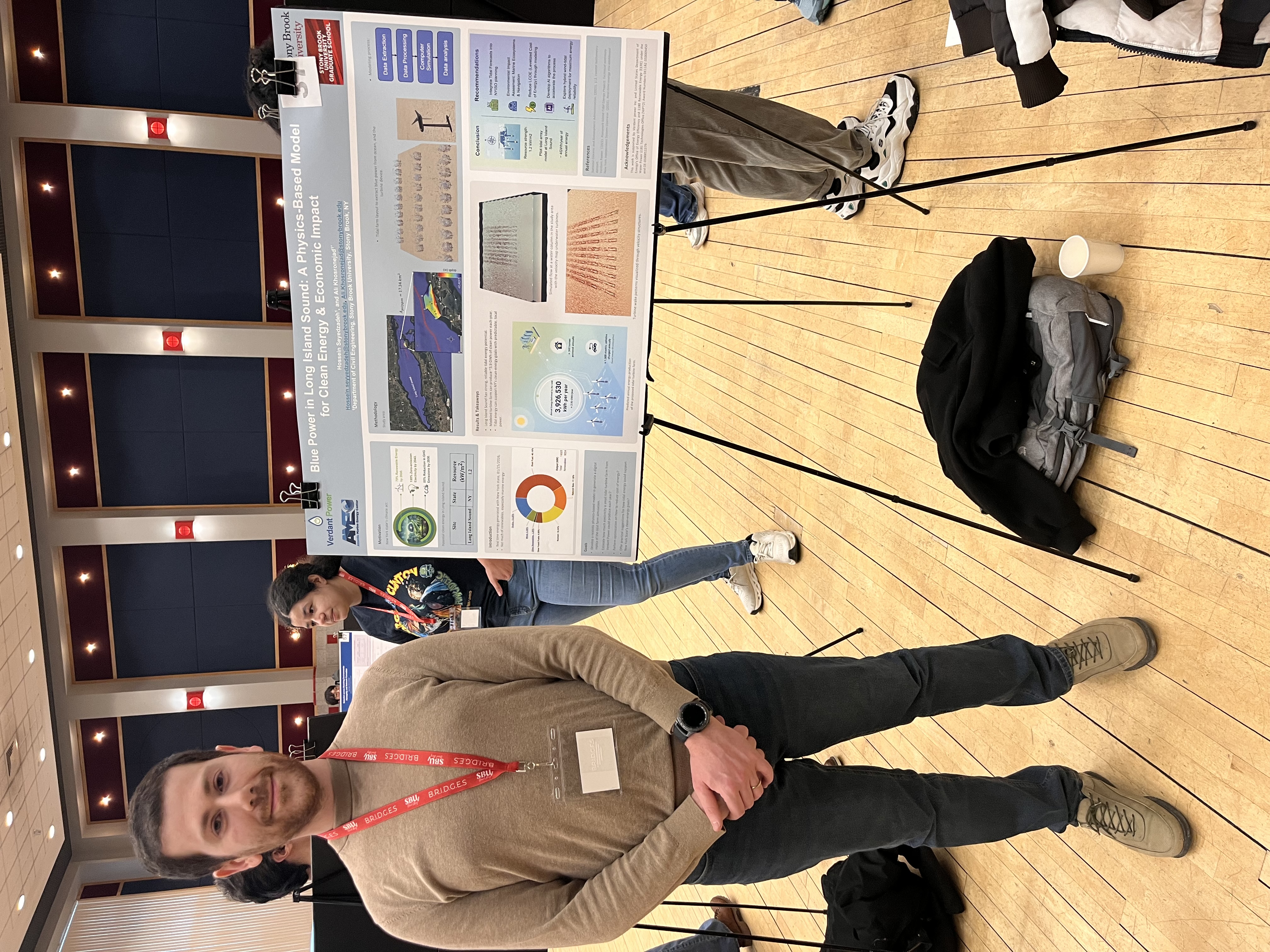 H. Seyedzadeh with poster