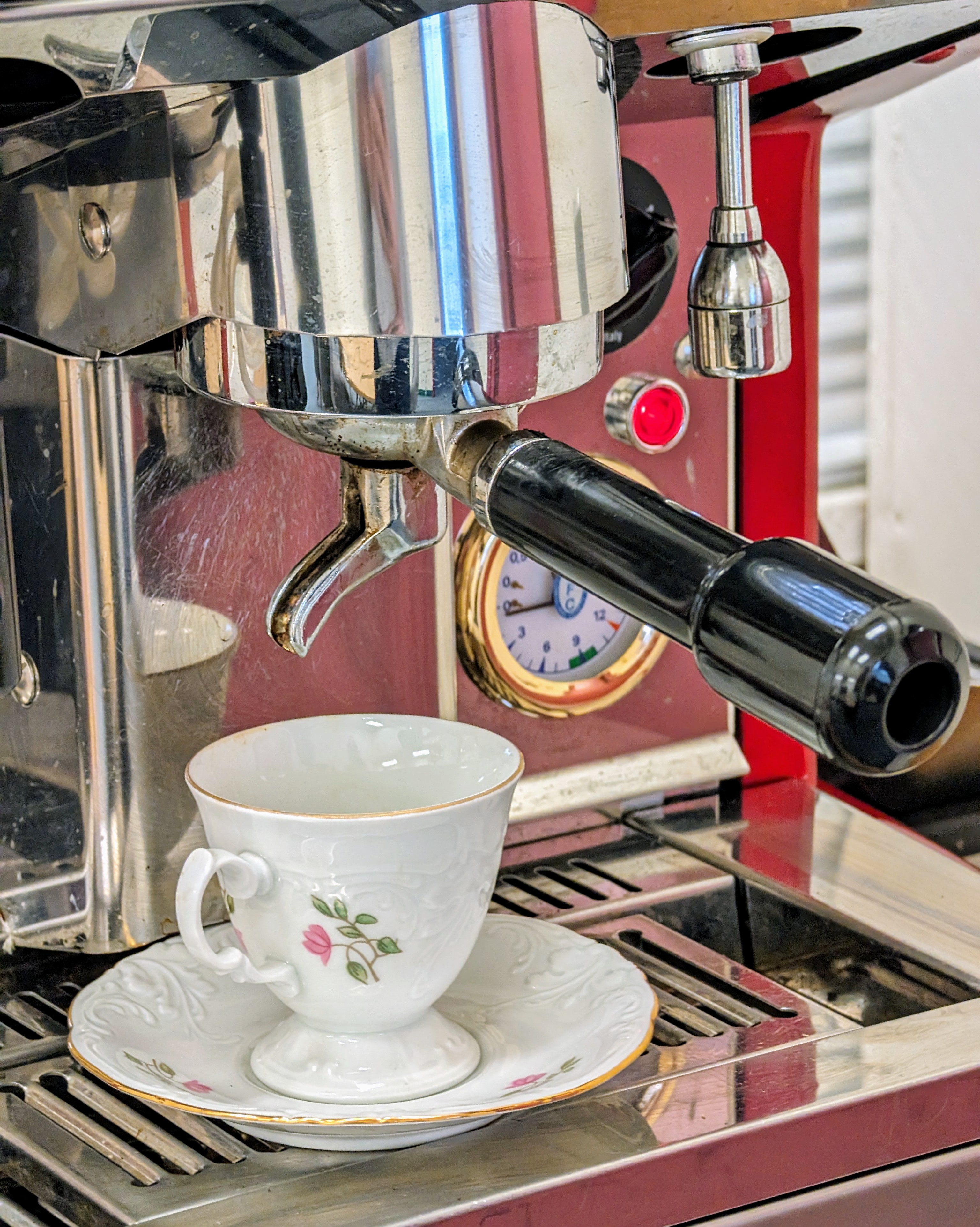 Espresso machine, saucer and cup at the Center for Italian Studies