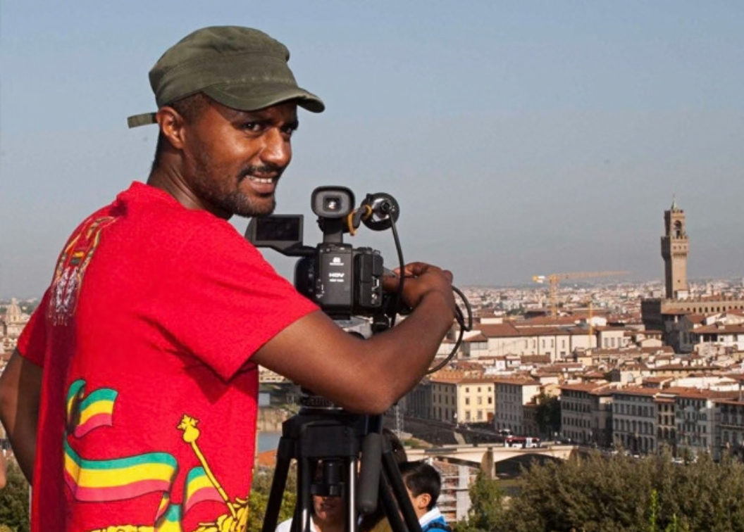photo of Yemer recording some scenery for one of his films.