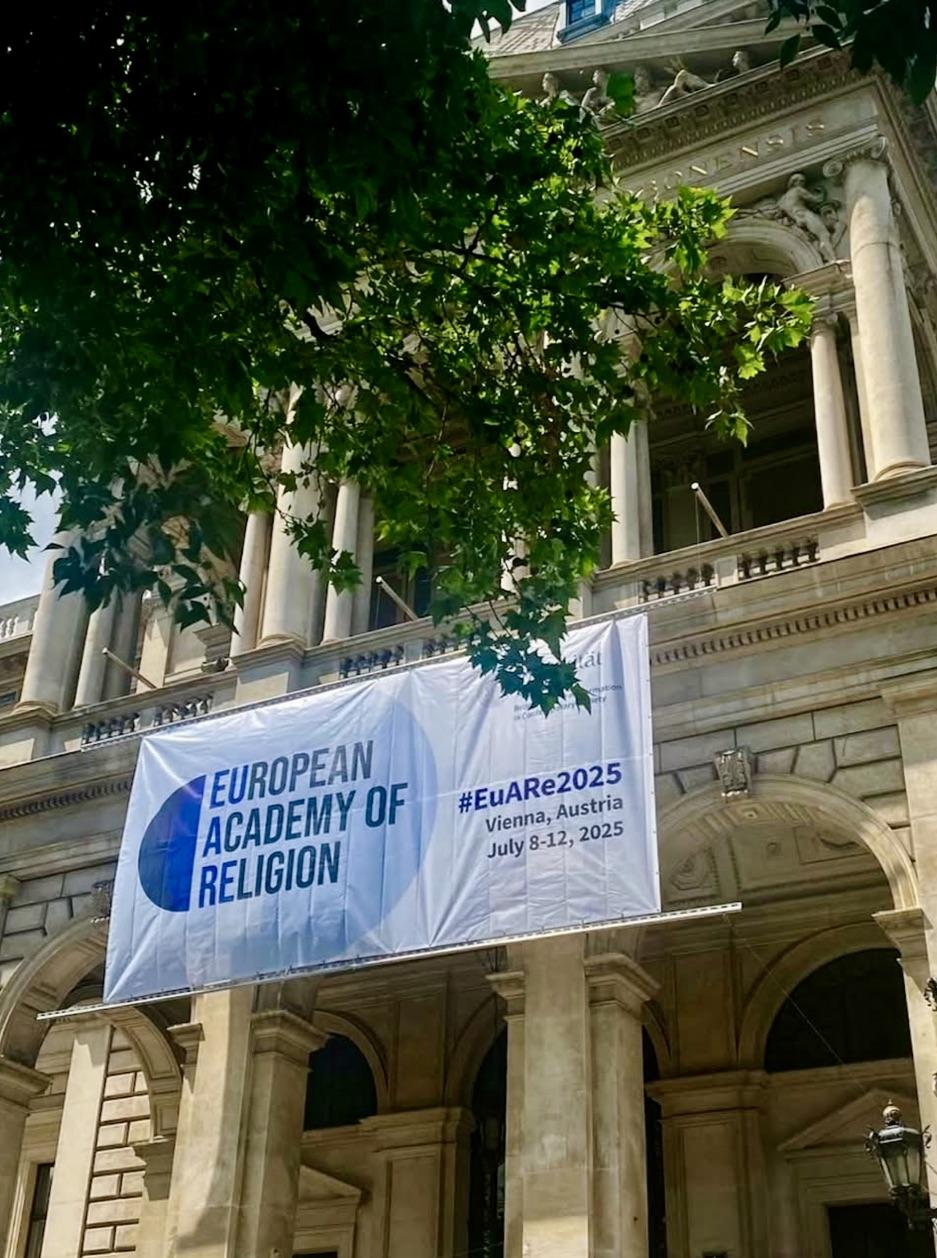 European Acadmy of Religion Banner of the European Academy of Religion advertising an event in Vienna, Austria in July 2025, displayed in front of a classical architecture building with ornate columns and green trees.