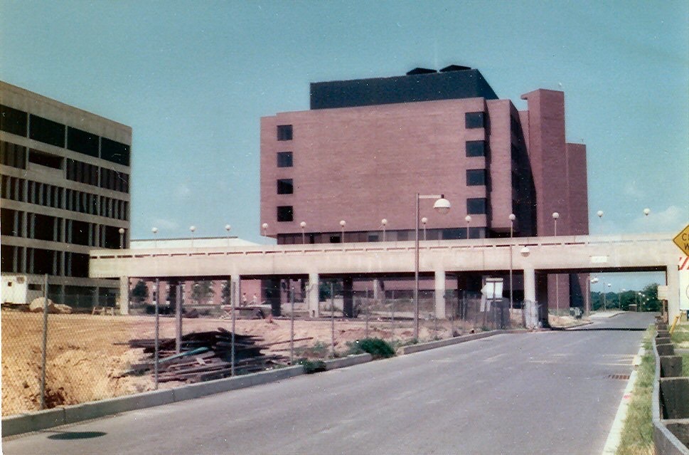 Stony Brook University, Library (left), Bridge to Nowhere (center), Chemistry (background), 1975. Photograph by Daniel Lack, 1975, BS Biology.